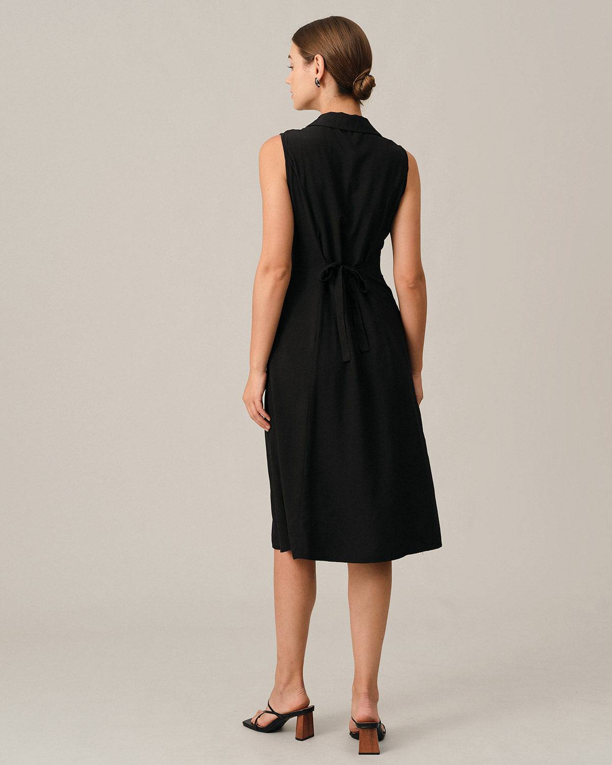 black sleeveless midi dress